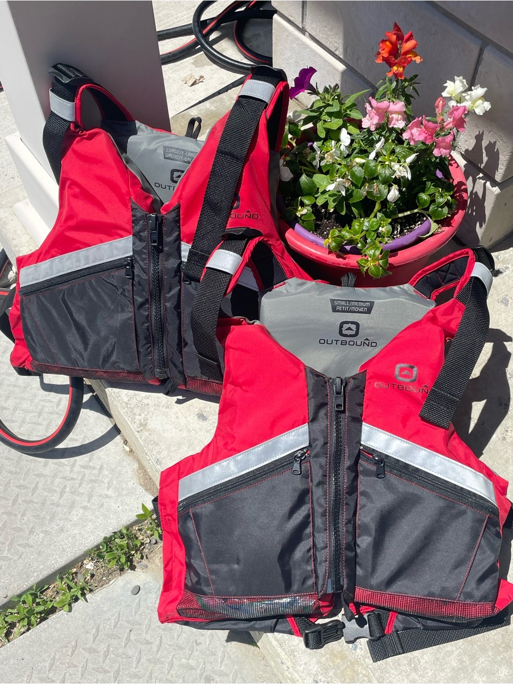 Like new Outbound adult Life Jackets - S/M & L/XL